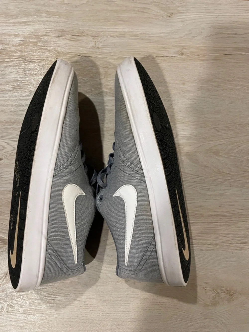 Nike Gray Canvas Low-Top Sneakers with White Swoosh